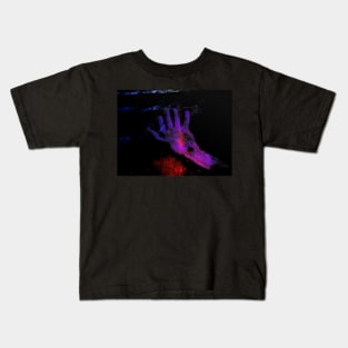 Digital collage, special processing. Hand laying on some wet surface. Psychedelic. Colorful. Blue, violet and red. Kids T-Shirt